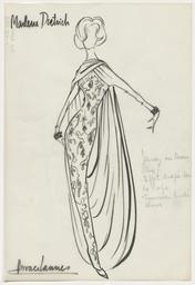Vorschaubild zu  'Marlene Dietrich - Ein bodenlanges, schmales, gemustertes Kleid mit Umhang'