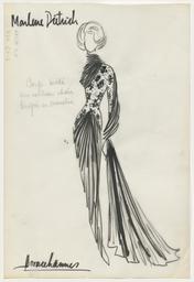 Vorschaubild zu  'Marlene Dietrich - Ein schmales Kleid mit gemustertem Oberteil und Plissee-Einsätzen'