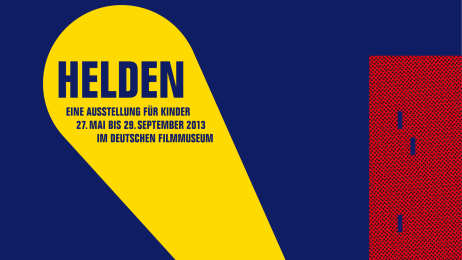 Schlichte Grafik mit einem gelben Leuchtkegel mit dem Text HELDEN, EINE AUSSTELLUNG F&Uuml;R KINDER und weiteren Informationen in blauen Buchstaben. Der Hintergrund ist ebenfalls blau.